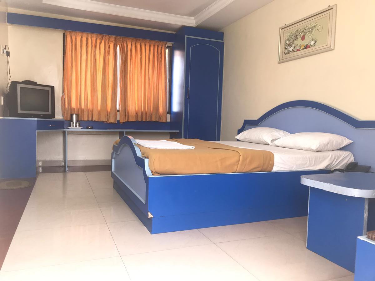 Sap Residency Hotel Tiruppur Bagian luar foto