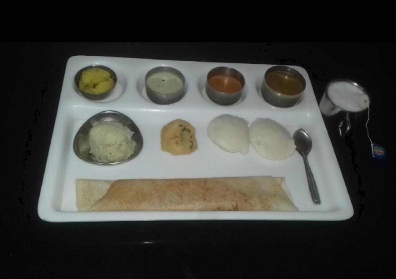Sap Residency Hotel Tiruppur Bagian luar foto